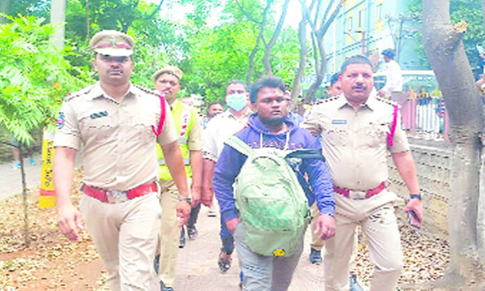 Young man climbs high tension tower in Borabanda Hyderabad creating drama over love issue