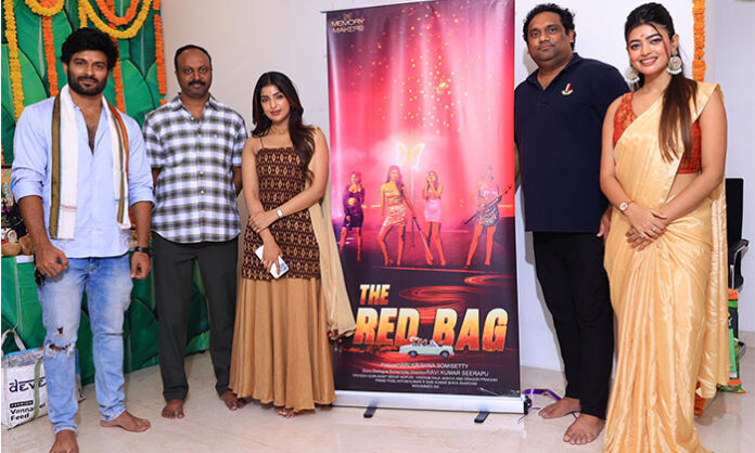 First look poster of The Red Bag featuring lead actors Kabir Duhan Singh, Prasad Behera, Radhya, and Monica; film produced by Harikrishna Somisetti and directed by Ravikumar Seerapu.