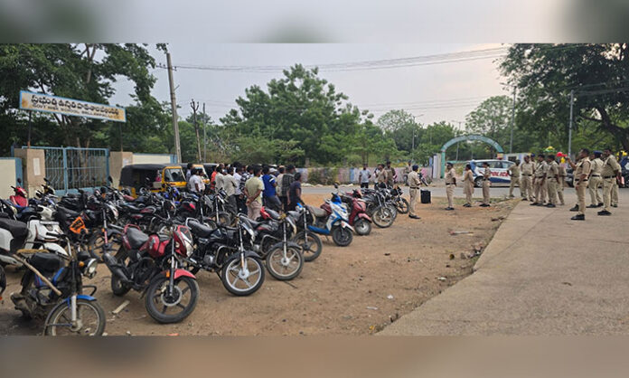 Bellampalli 1 Town SHO K. Srinivas Rao interacts with residents during the Community Contact Program conducted to enhance public safety and prevent crime.