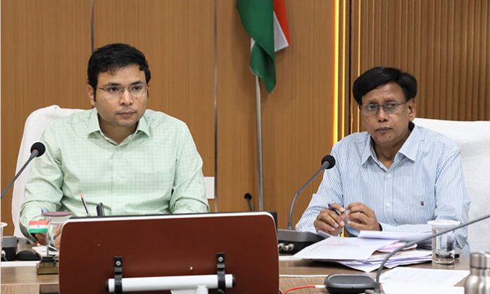 District Collector Bhavesh Mishra reviewing CMR rice delivery process with officials and issuing instructions