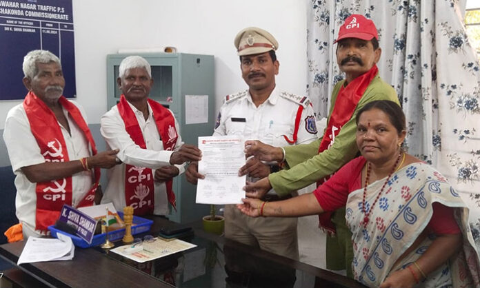 CPI leaders submitting memorandum to Jawahar Nagar traffic police over traffic congestion near wine shops