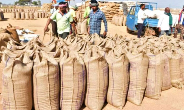 Farmers waiting at procurement centers with harvested grain sacks amid delays, shortage of storage facilities, and concerns over MSP procurement issues.