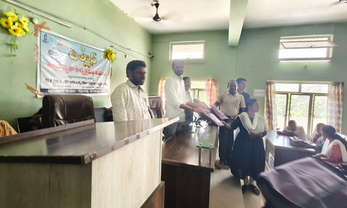 Officials distributing enumeration kits to field staff during Census 2027 house listing preparation in Bellampally municipal area