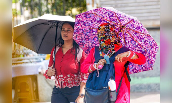 People struggling under severe heatwave conditions as temperatures in India rise between 44°C and 46°C, prompting health warnings from IMD.