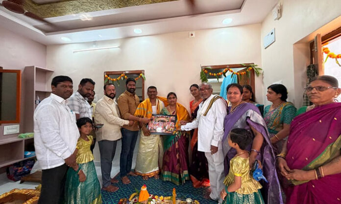 Housewarming ceremony under Indiramma Housing Scheme in Bellampalli with local leaders