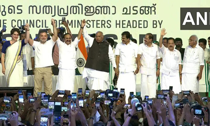 Congress leaders Rahul Gandhi and Priyanka Gandhi seen on stage during Kerala Chief Minister swearing-in ceremony amid protocol violation allegations.
