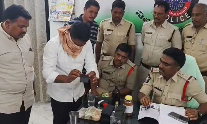 Police investigation into a black money scam in Kurnool where a man was cheated using fake currency trick and chemical illusion by fraudsters.
