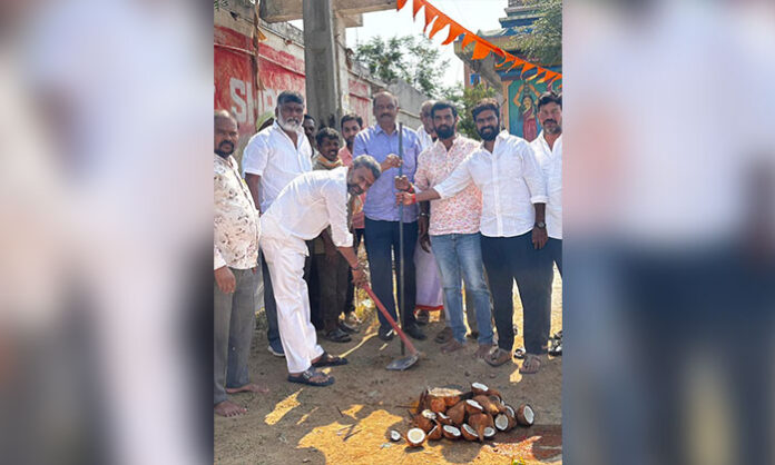 Officials and local leaders attending groundbreaking ceremony for high mast light installation in Madaram village