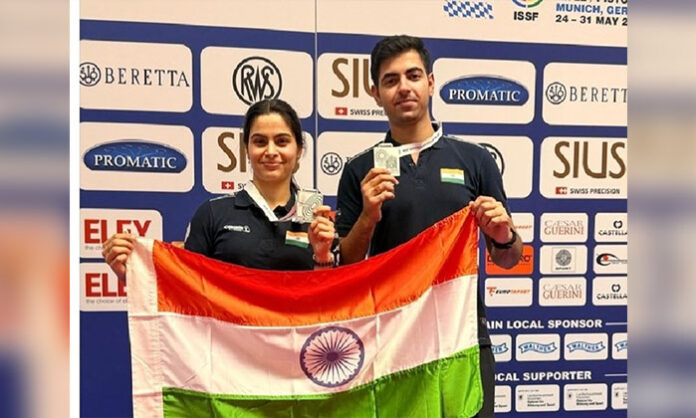 Indian shooters Manu Bhaker and Samrat Rana celebrating after winning the silver medal in the 10m Air Pistol Mixed Team event at the ISSF World Cup.