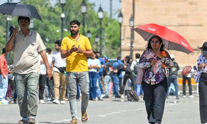 Telangana districts experiencing extreme heatwave conditions with temperatures above 45°C amid delayed monsoon arrival and IMD red alert warning.