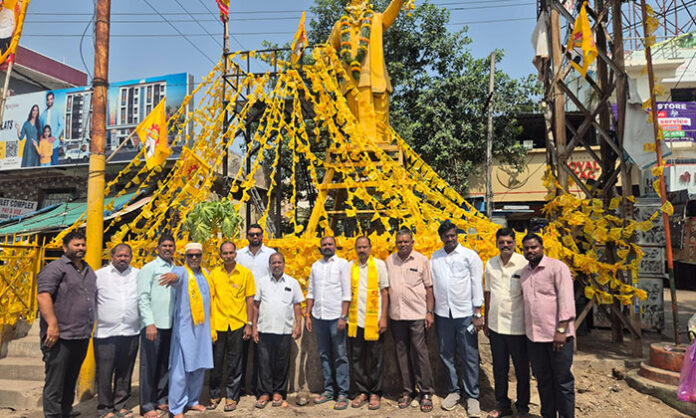 NTR fans and leaders garlanding the statue of Nandamuri Taraka Rama Rao during grand birth anniversary celebrations in Medchal division.