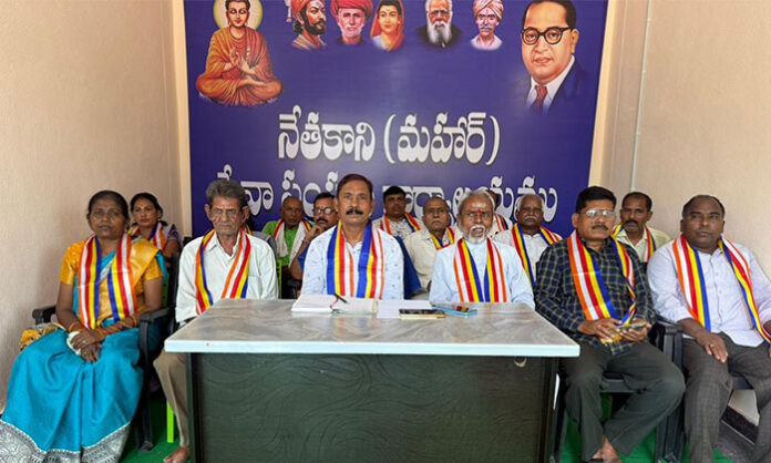 Nethakani Mahar Seva Sangham State President Durgam Swamy addressing press conference thanking leaders for MPLADS funds for building construction
