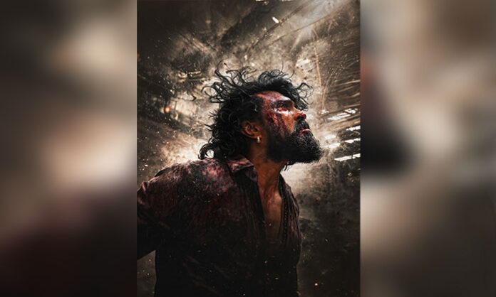 Ram Charan in intense rural action look from Peddi movie release poster