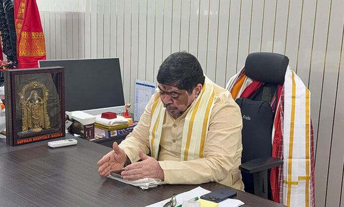 Minister Ponnam Prabhakar conducting a teleconference with officials to review grain procurement arrangements in Husnabad constituency.