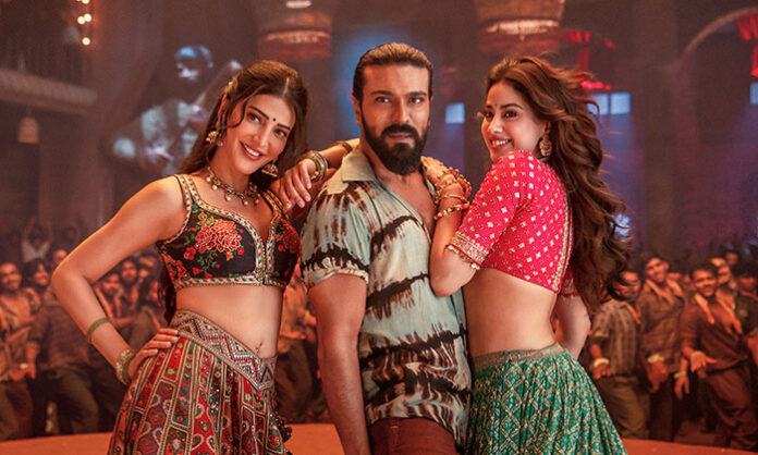 Ram Charan, Shruti Haasan, and Janhvi Kapoor performing in the grand mass song Hellallallo from the movie Peddi composed by AR Rahman.