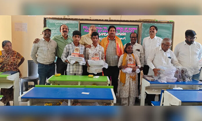 Sharadamba Brahmin Welfare Association honoring top-ranking students during a felicitation program in Kapra Mandal