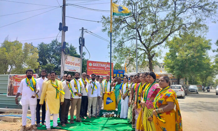 Telangana Rakshana Sena leaders hoisting the party flag during the Flag Festival celebration in Medchal constituency.