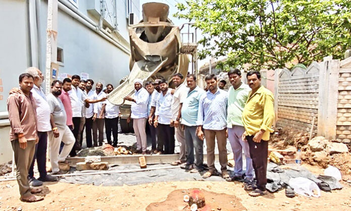 Sarpanch Gorlapalli Ashok inaugurating CC road construction works in Venkammaguda village aimed at transforming it into a model village with improved infrastructure.