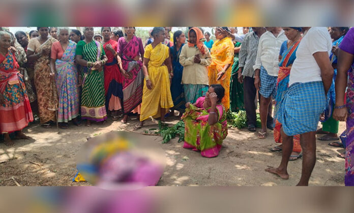 Police and villagers gathered at the spot in Thimmareddypalli village after a woman died from falling off a tree while collecting fodder for goats.
