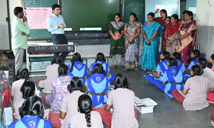 District Collector Bhavesh Mishra interacts with students during a surprise inspection of KGBV Maskapur and emphasizes skill-based learning in government schools.