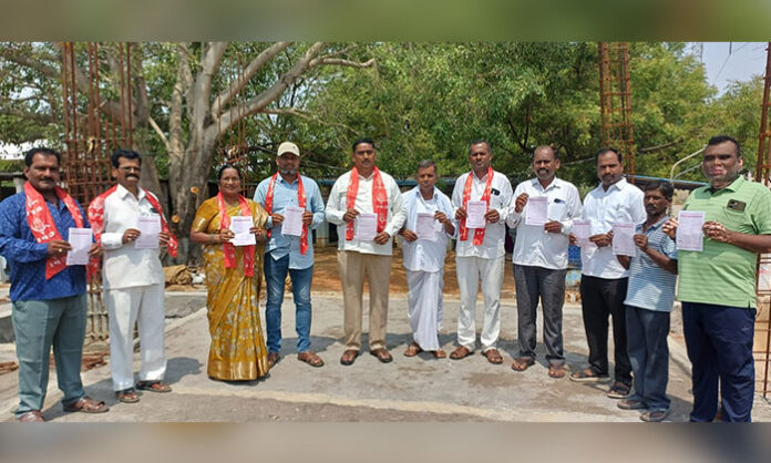 CPI leaders release a pamphlet in Yadagirigutta calling for a protest against rising prices of essential commodities, petrol, diesel, and cooking gas.
