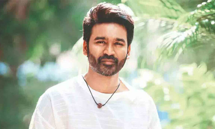 Tamil actor Dhanush with father Kasthuri Raja amid speculation about his possible entry into Tamil Nadu politics.