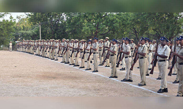 SP Janaki Sharmila receives salute from police personnel during the weekly parade conducted at the District Police AR Headquarters.