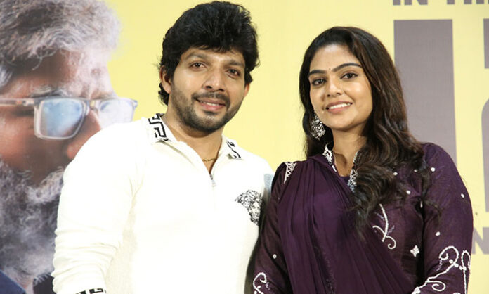 Grand trailer launch event of Telugu film I Am Handsome at Prasad Labs in Hyderabad with cast and crew on stage.
