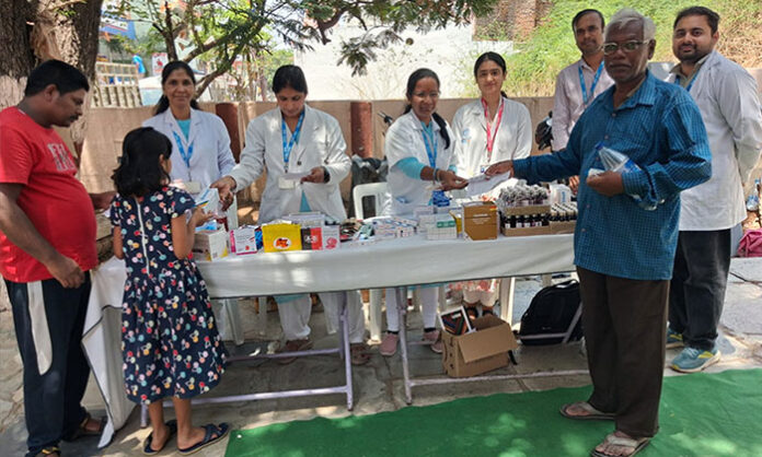 Doctors from ICMR National Institute of Nutrition conducting free medical check-ups and health consultations for residents at Addagutta medical camp