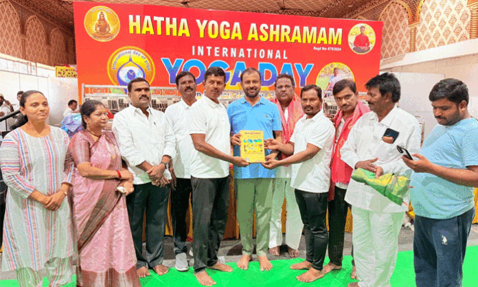 Participants perform yoga asanas during the grand International Yoga Day celebration held at Jawahar Nagar in Medchal-Malkajgiri district.