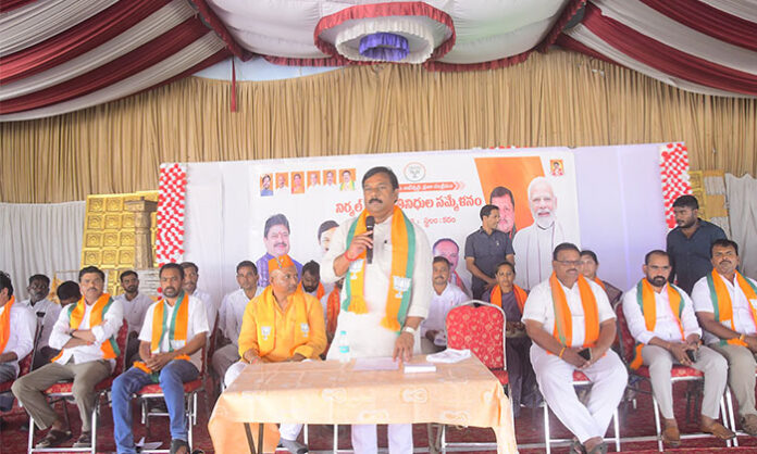 BJP leaders and Nirmal MLA Aleti Maheshwar Reddy speaking at a meeting in Kadem Mandal marking 12 years of Narendra Modi’s government development achievements.