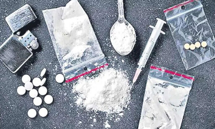 Police officials inspecting a farmhouse in Sangareddy district after busting an interstate mephedrone drug manufacturing unit.