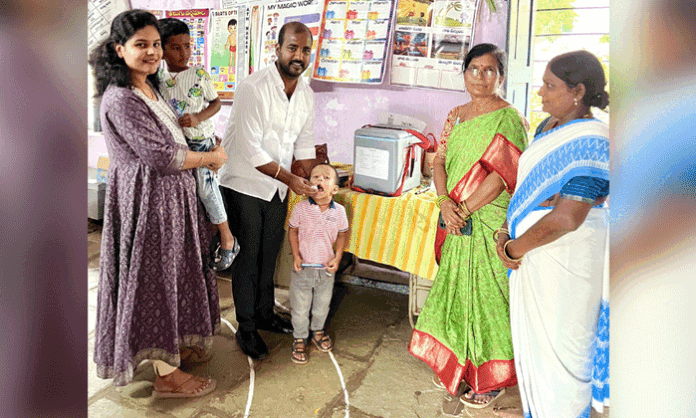 Ward Member Mogulla Jeevan Kumar Reddy administers Pulse Polio drops to children at an Anganwadi centre in Abdullapurmet.