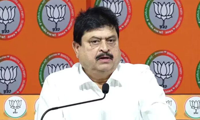 BJP Telangana President Ramchander Rao addressing a press conference on grain procurement and farmer issues in Telangana.