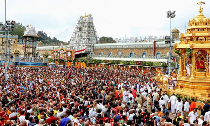 Large crowd of devotees visiting Tirumala temple for Lord Venkateswara darshan during May month with record-breaking numbers reported by TTD.