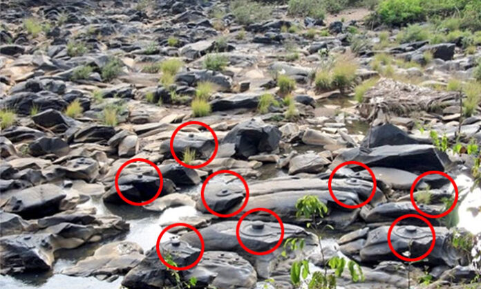 Hundreds of Shiva Lingas carved on rocks in the Shalmala River at Sahasra Linga Kshetram in Uttara Kannada, Karnataka