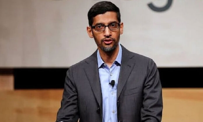 Students walking out of Stanford University graduation ceremony during Sundar Pichai's speech while holding Palestinian flags and protest banners