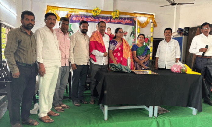 PRTU Telangana District President Shyam Babu addresses a teacher felicitation program at ZP High School in Koduru, highlighting the importance of teaching life lessons alongside academics.