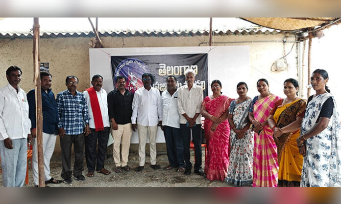 Telangana Praja Natya Mandali leaders and members attend the Medchal District Council meeting in Jawahar Nagar to discuss cultural awareness programs and training activities.