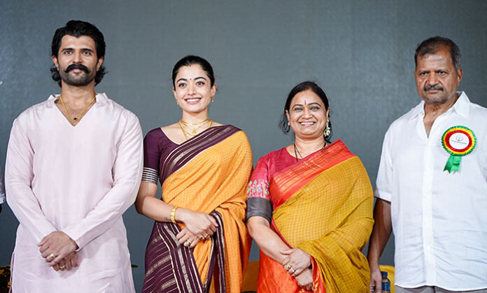 Vijay Deverakonda and Rashmika Mandanna presenting scholarships to meritorious government school students through The Deverakonda Foundation.