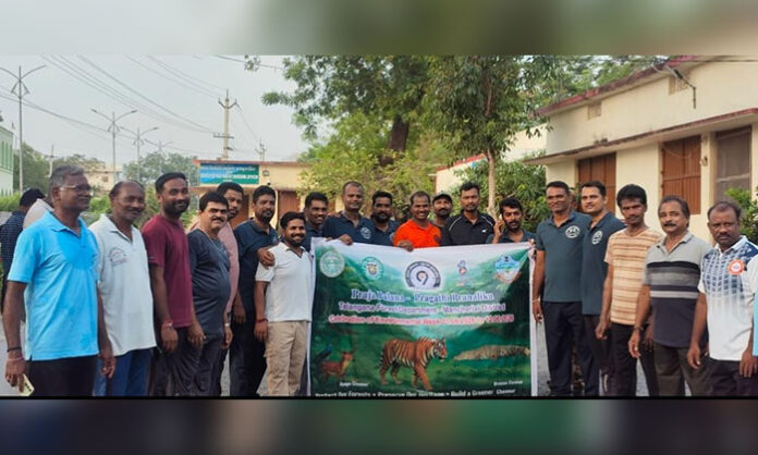 Students, youth, and citizens participating in a 3K walk competition organized by the Forest Department in Chennur on World Bicycle Day