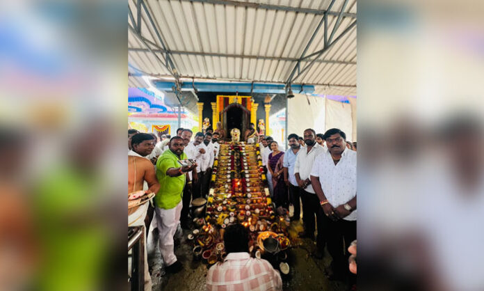 Devotees participate in the 11th anniversary celebrations of Hariharaputra Ayyappa Swamy Temple with special rituals and bhajans in Jawahar Nagar.