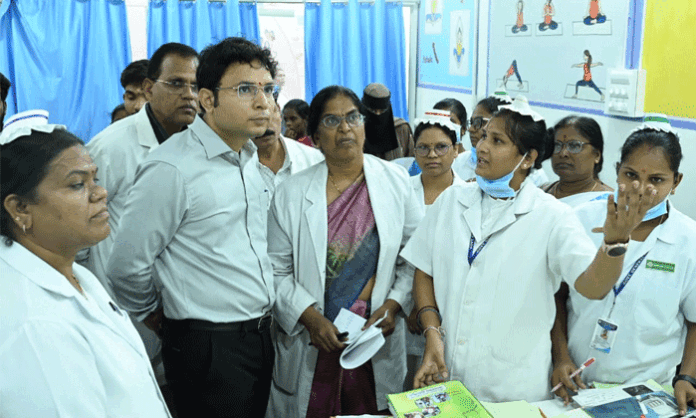 District Collector Bhavesh Mishra inspecting the Maternal and Child Health Hospital, reviewing medical services and directing officials to increase normal deliveries.