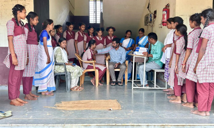 Medical officers conduct health camps and RDT tests for students at government girls' and boys' hostels in Venkatapuram.
