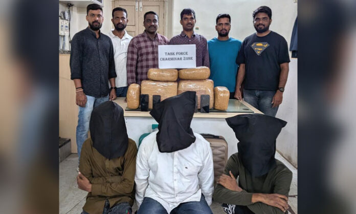 Hyderabad Task Force and Balapur Police displaying 22.22 kilograms of seized ganja after busting an interstate smuggling gang.