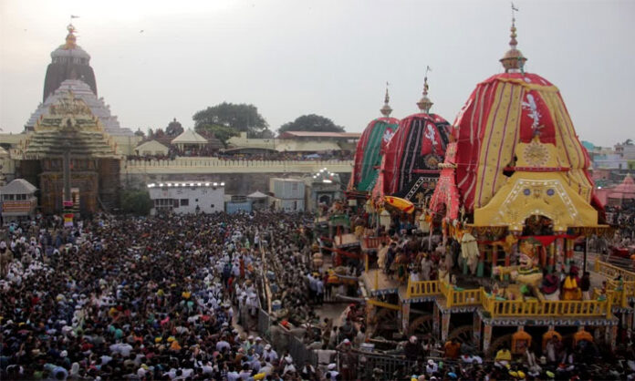 Devotees gather for the grand Jagannath Rath Yatra in Puri as the sacred chariots of Lord Jagannath, Balabhadra, and Subhadra begin their annual procession.