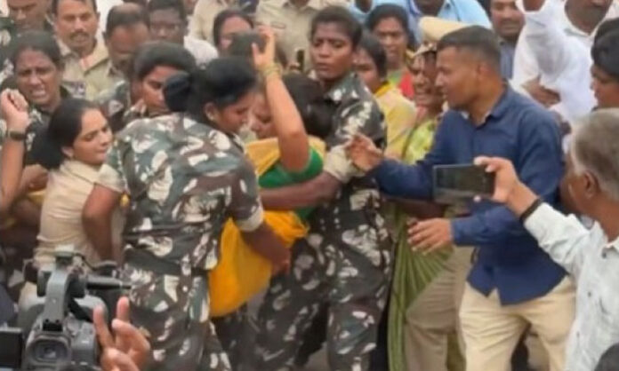 Kalvakuntla Kavitha being detained by police during a protest in Boduppal demanding housing plots for Telangana movement activists.