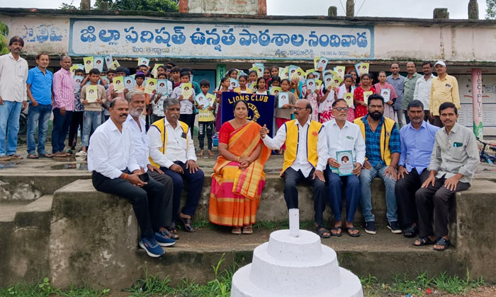 Lions Club Distributes Free Notebooks at Nandivada High School0