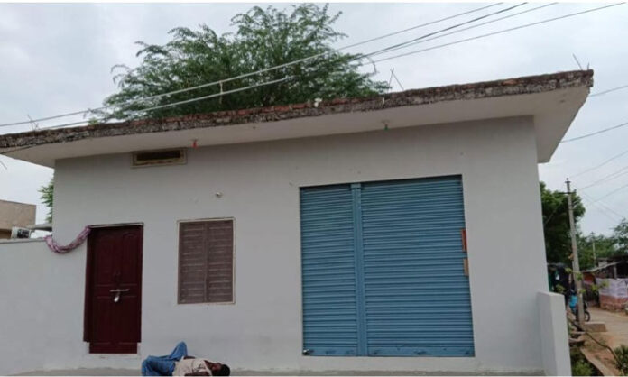 Dangerously low-hanging electricity wires over a house in Hanumanthula Gudem village raising serious safety concerns.