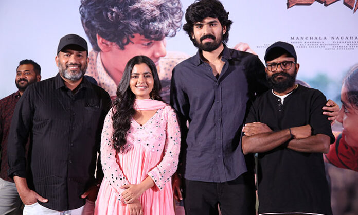 The cast and crew of Maremma during the Maari Song Launch Event ahead of the film's theatrical release.